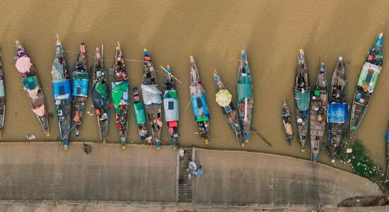 Panoramic view of Kratie’s Mekong River for a scenic Kratie Tours banner by Legend Travel Group.